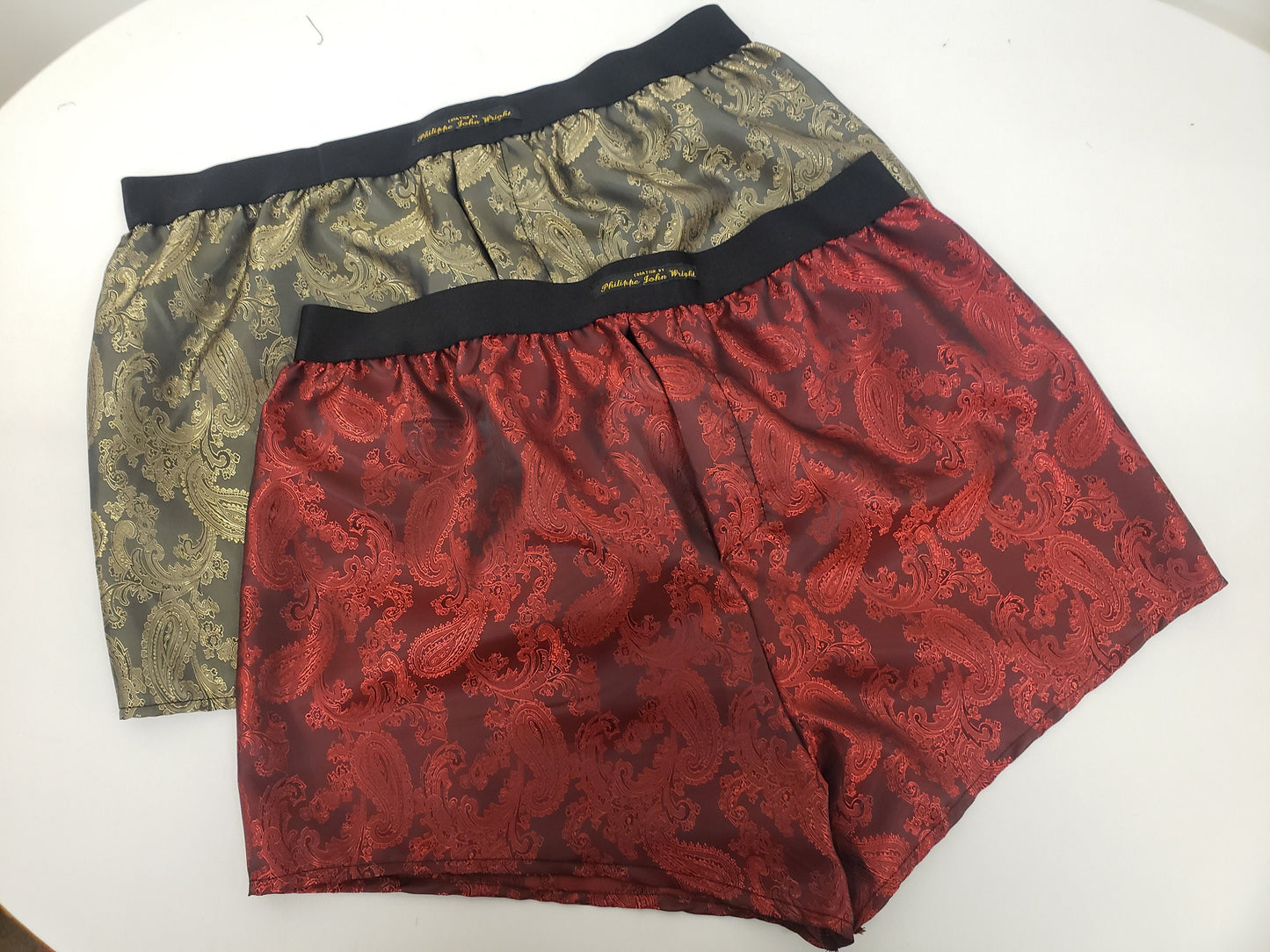 Two silk boxer shorts gold and burgundy double bundle paisley motif made in France