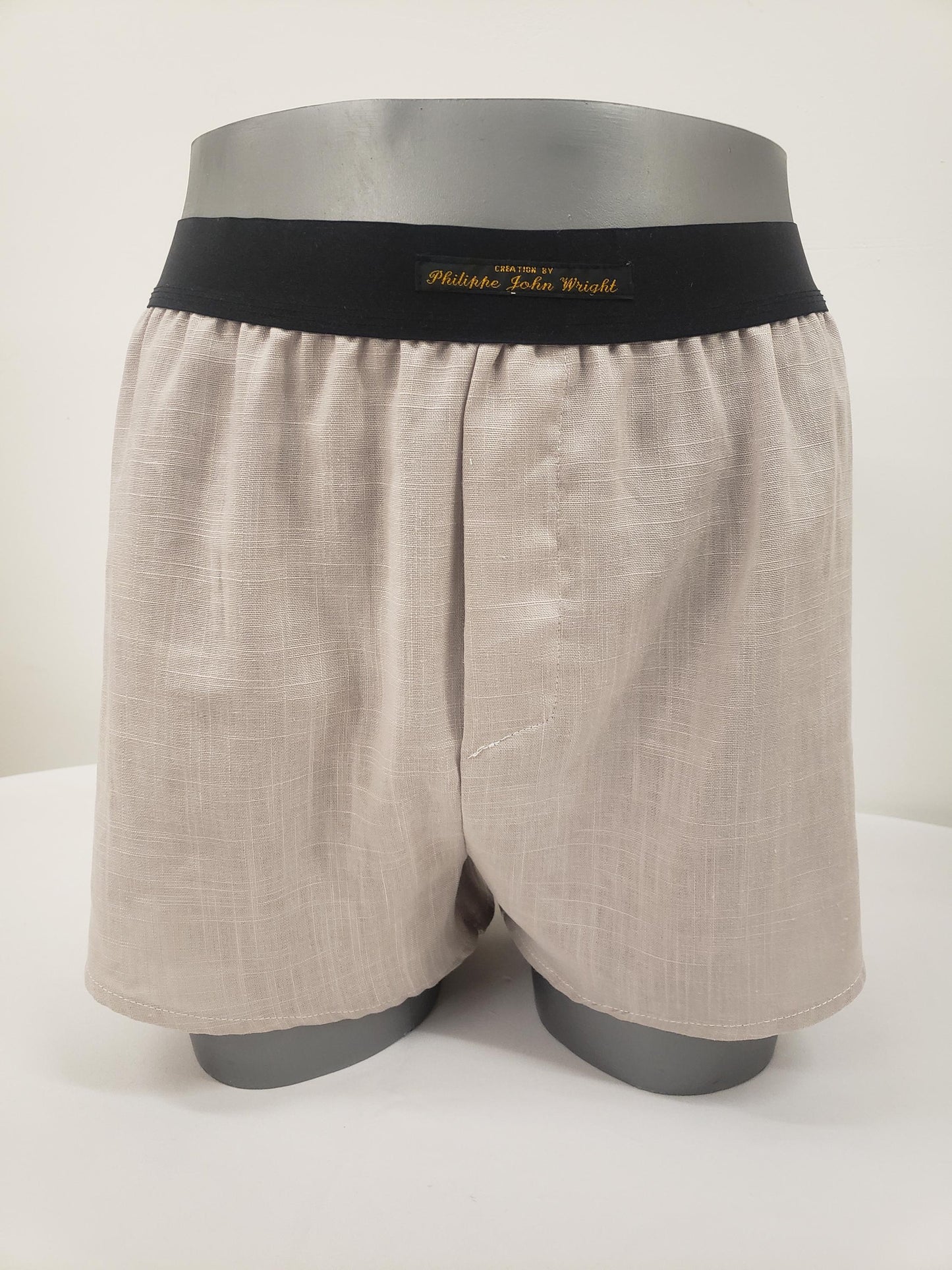 His and her BEIGE LINEN mens boxer short and womans linen boy shorts with black elastic.