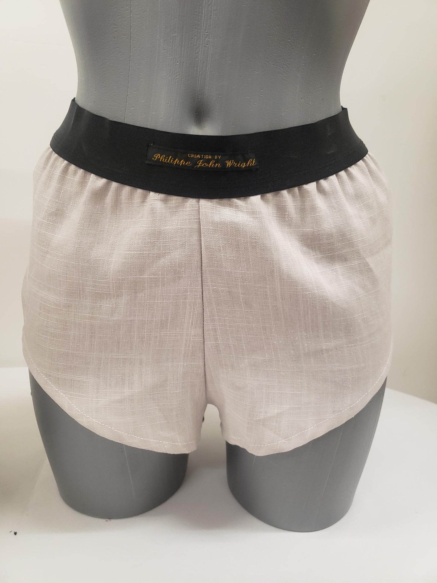 His and her BEIGE LINEN mens boxer shorts and womens linen boy shorts with black elastic.