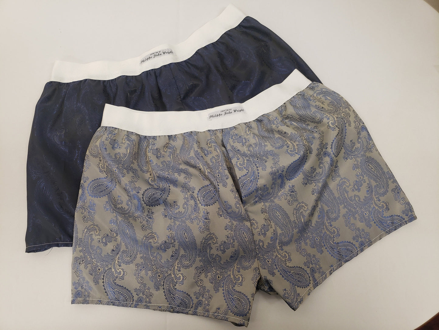 Two silk boxer shorts double bundle paisley motif made in France navy and royal blue