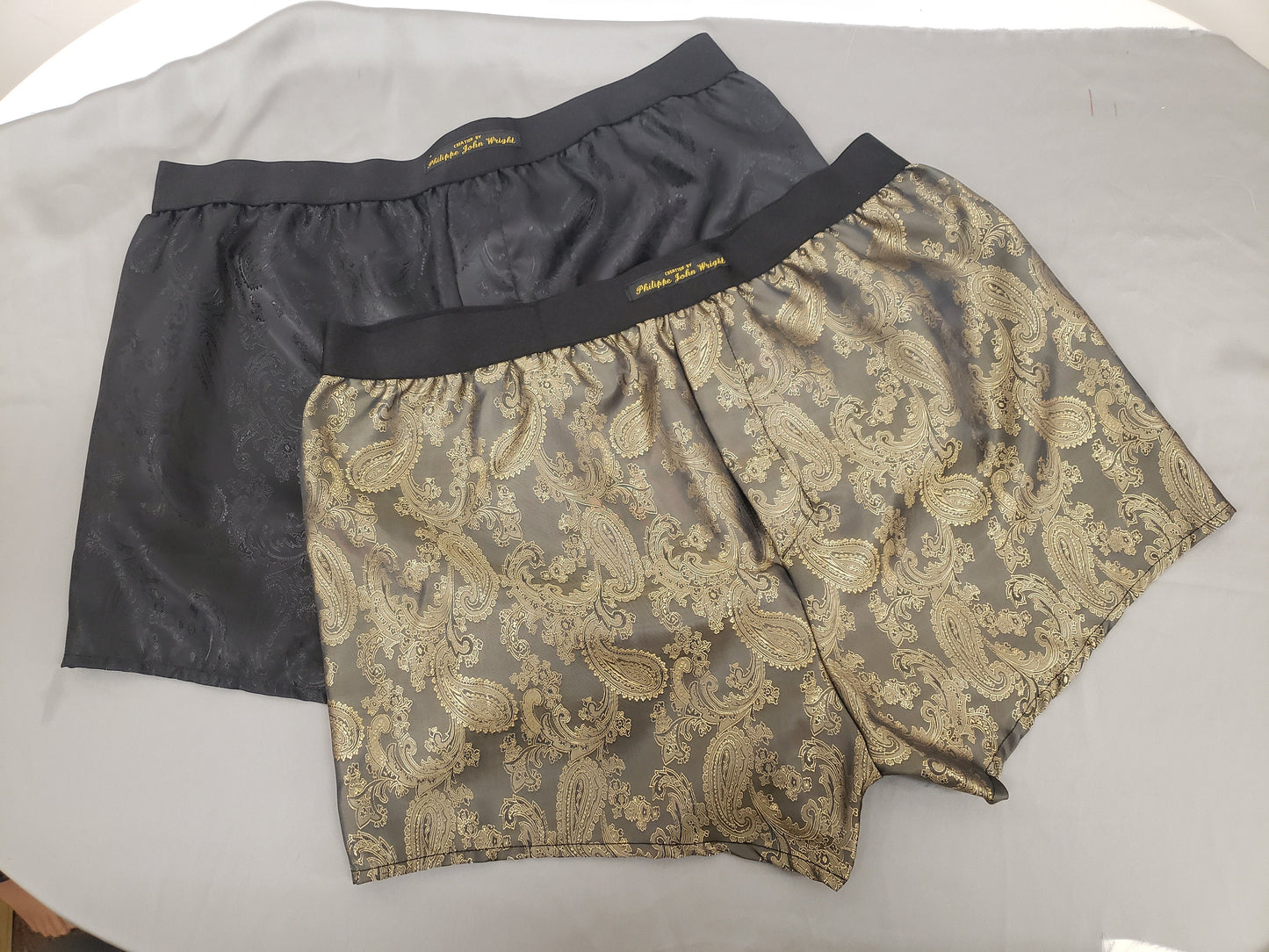Two silk boxer shorts gold and navy double bundle paisley pattern made in France