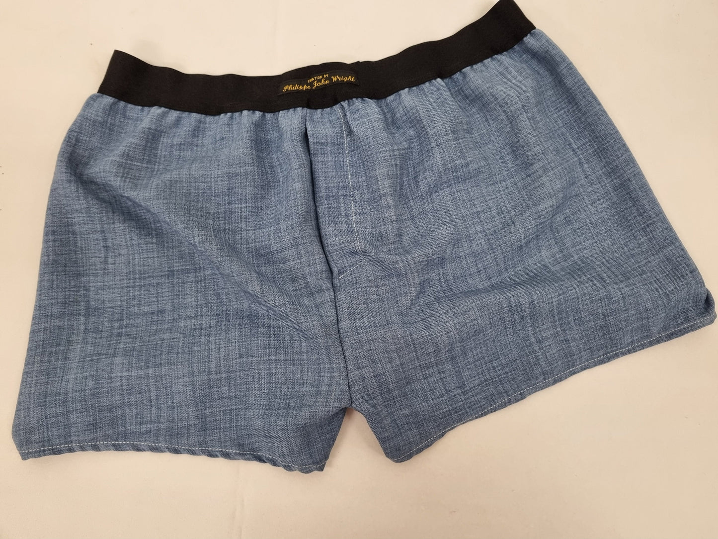 Blue LINEN men boxer shorts with black elastic.