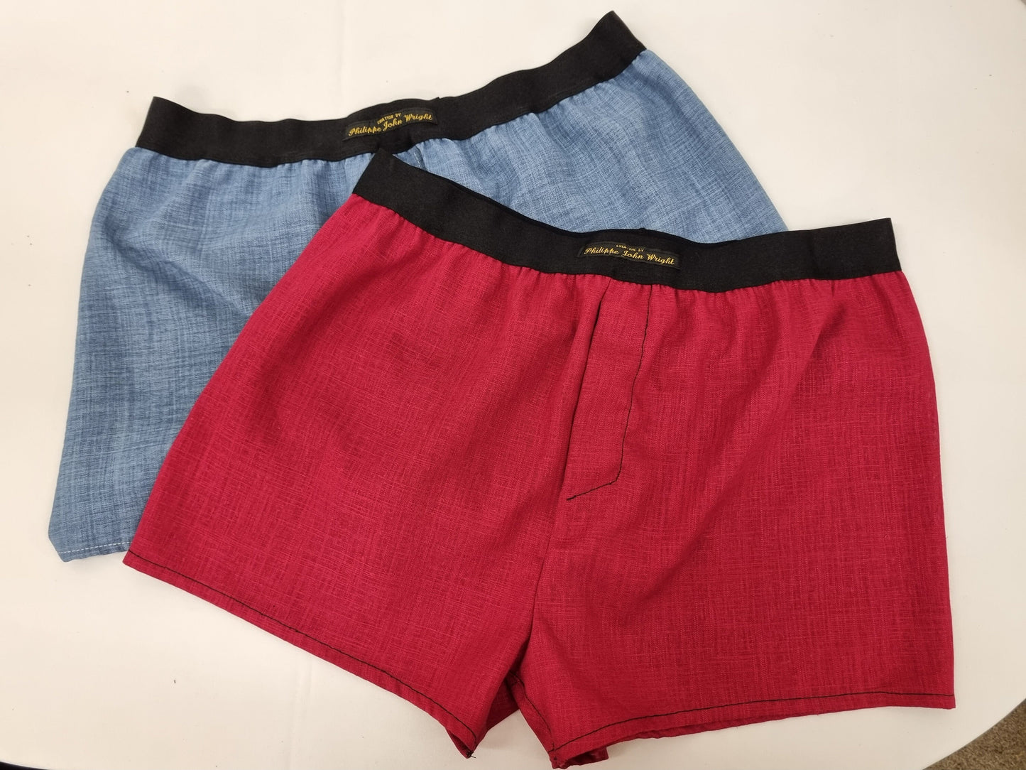 Two Red and blue LINEN men boxer short bundle with black elastic.