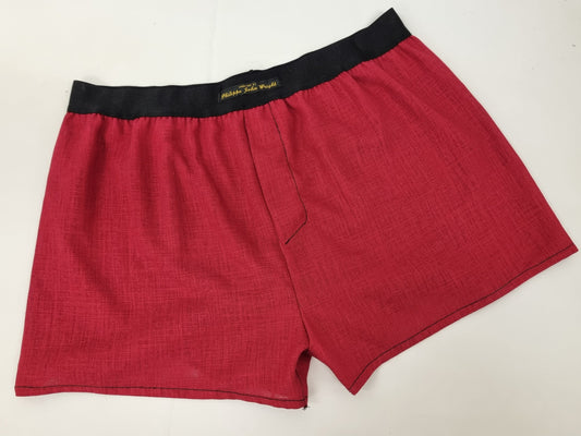 Red LINEN men boxer short with black elastic.