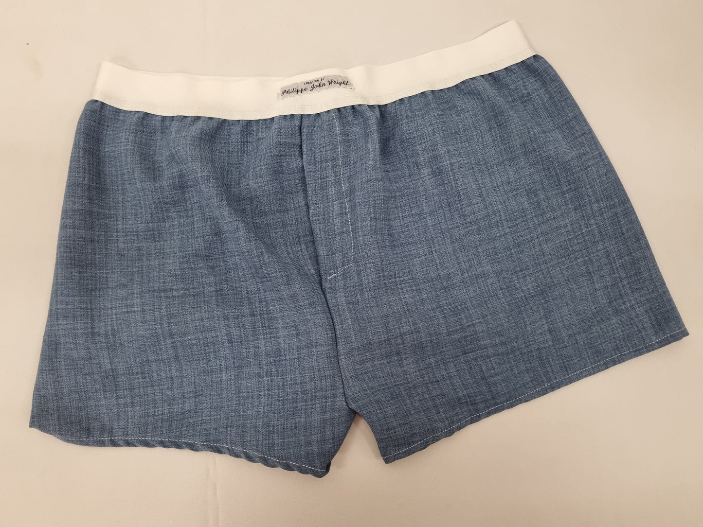 Blue LINEN men boxer short with white elastic.