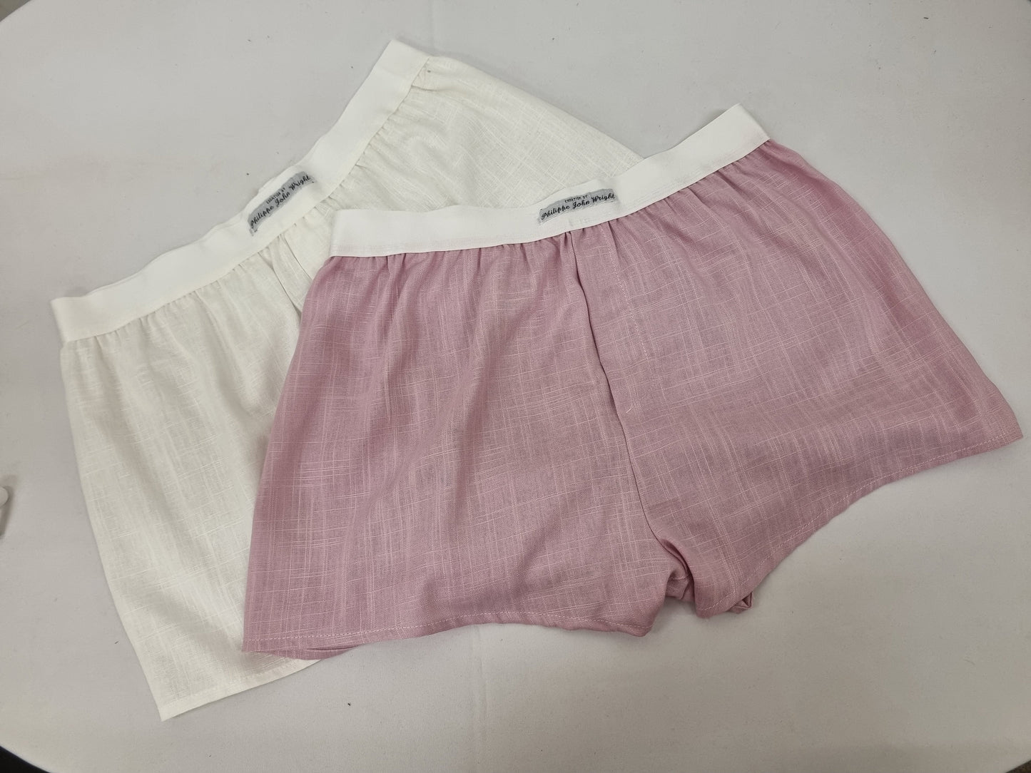 Two pink and off white LINEN men boxer short bundle with white elastic.
