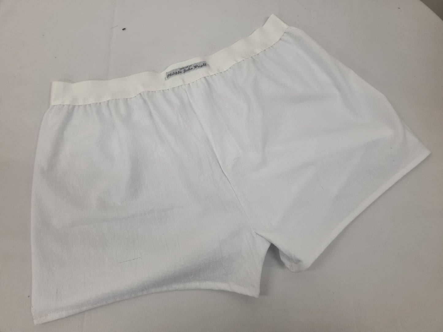 WHITE natural organic cotton men boxer short with white elastic.