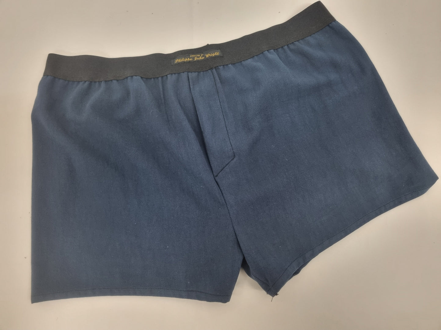 BLUE natural organic cotton men boxer short with white elastic.