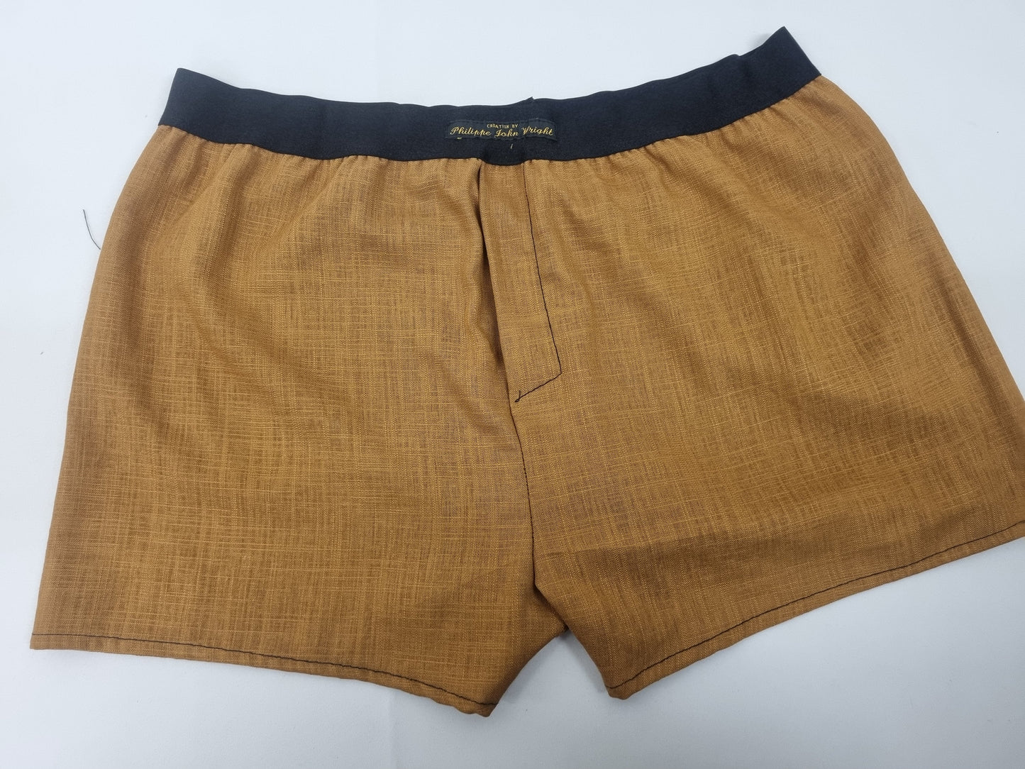 LINEN chestnut brown men boxer short with black elastic.
