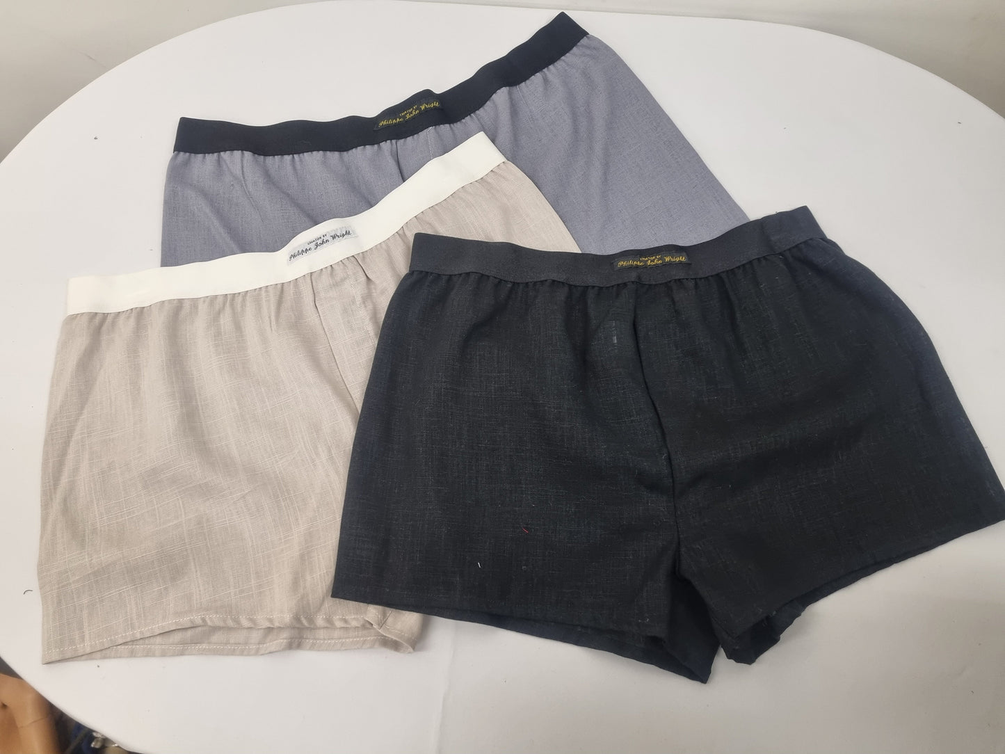 Three LINEN men boxer short bundle with black elastic. grey, black, beige.
