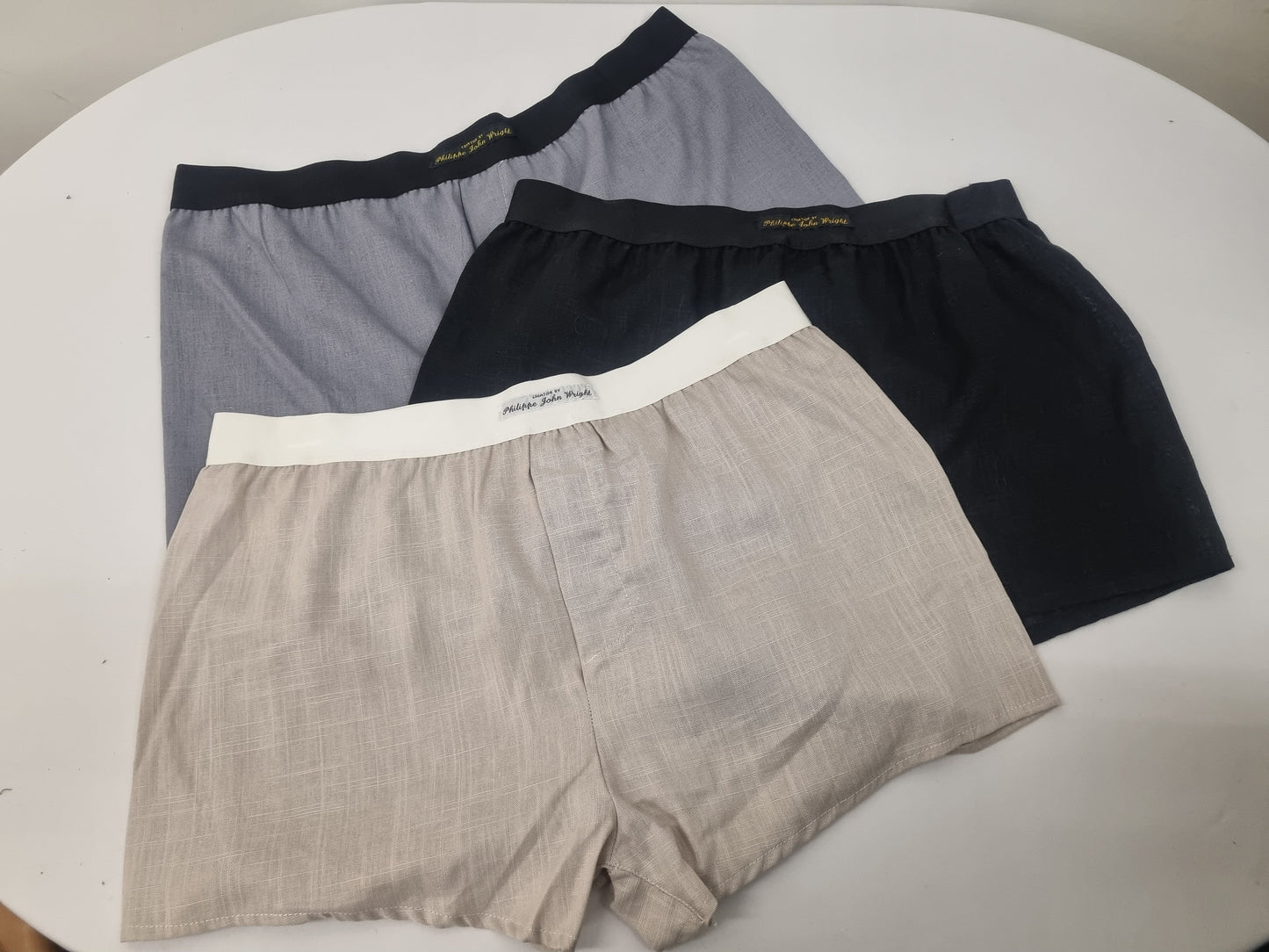 Three LINEN men boxer short bundle with black elastic. gray, black, beige.