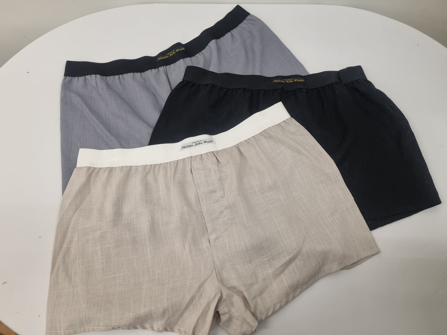 Three LINEN men boxer short bundle with black elastic. grey, black, beige.