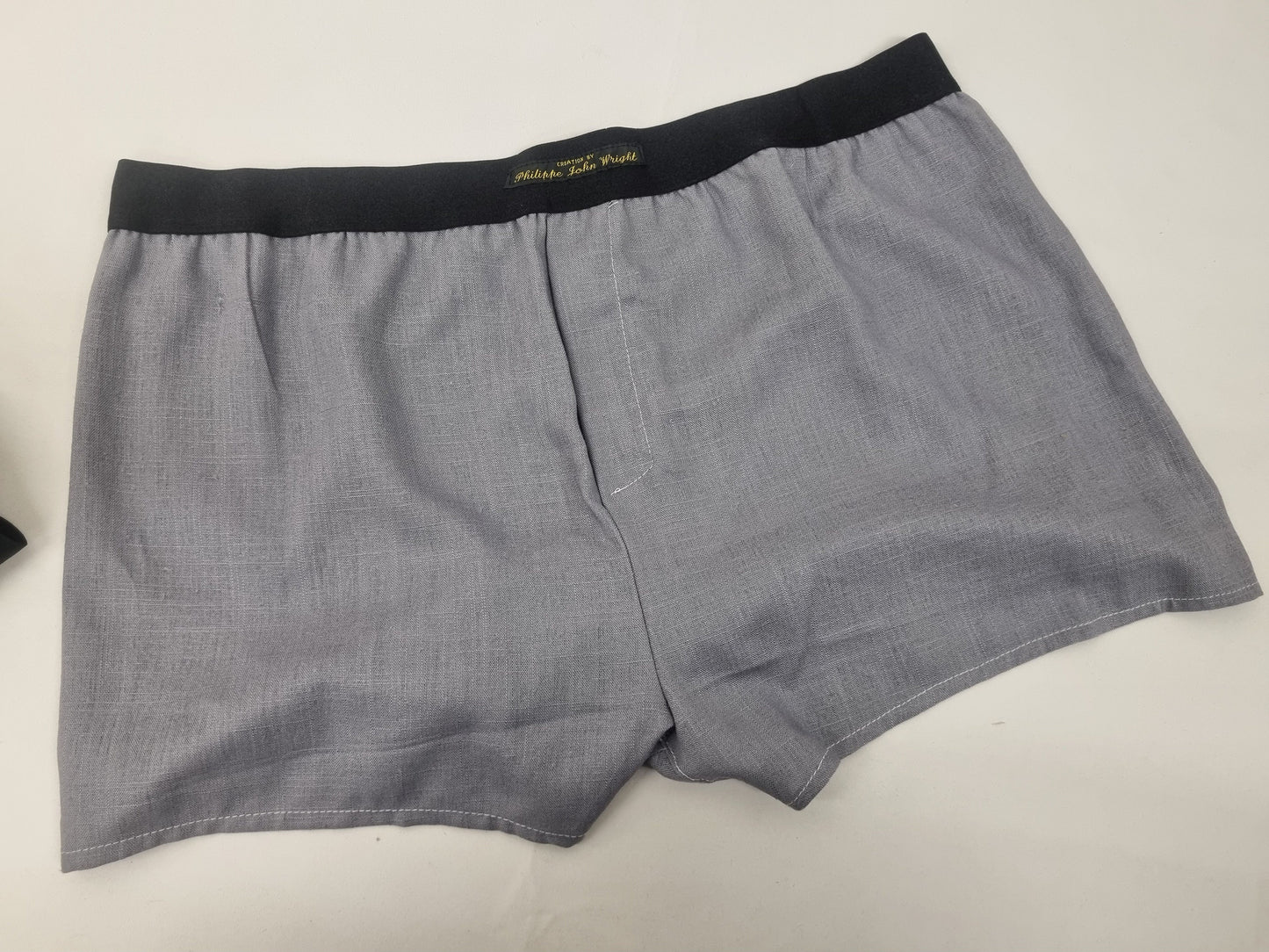 LINEN grey men boxer short with black elastic.