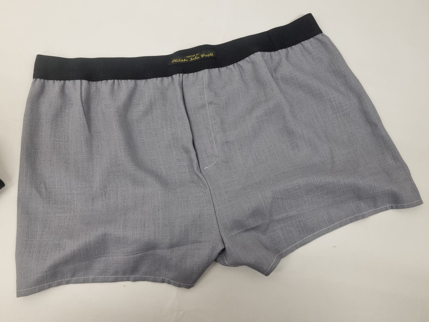 LINEN grey men boxer short with black elastic.
