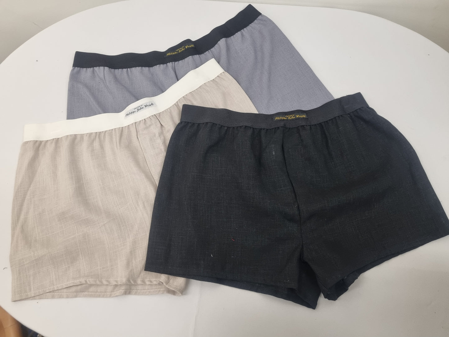 Three LINEN men boxer short bundle with black elastic. grey, black, beige.