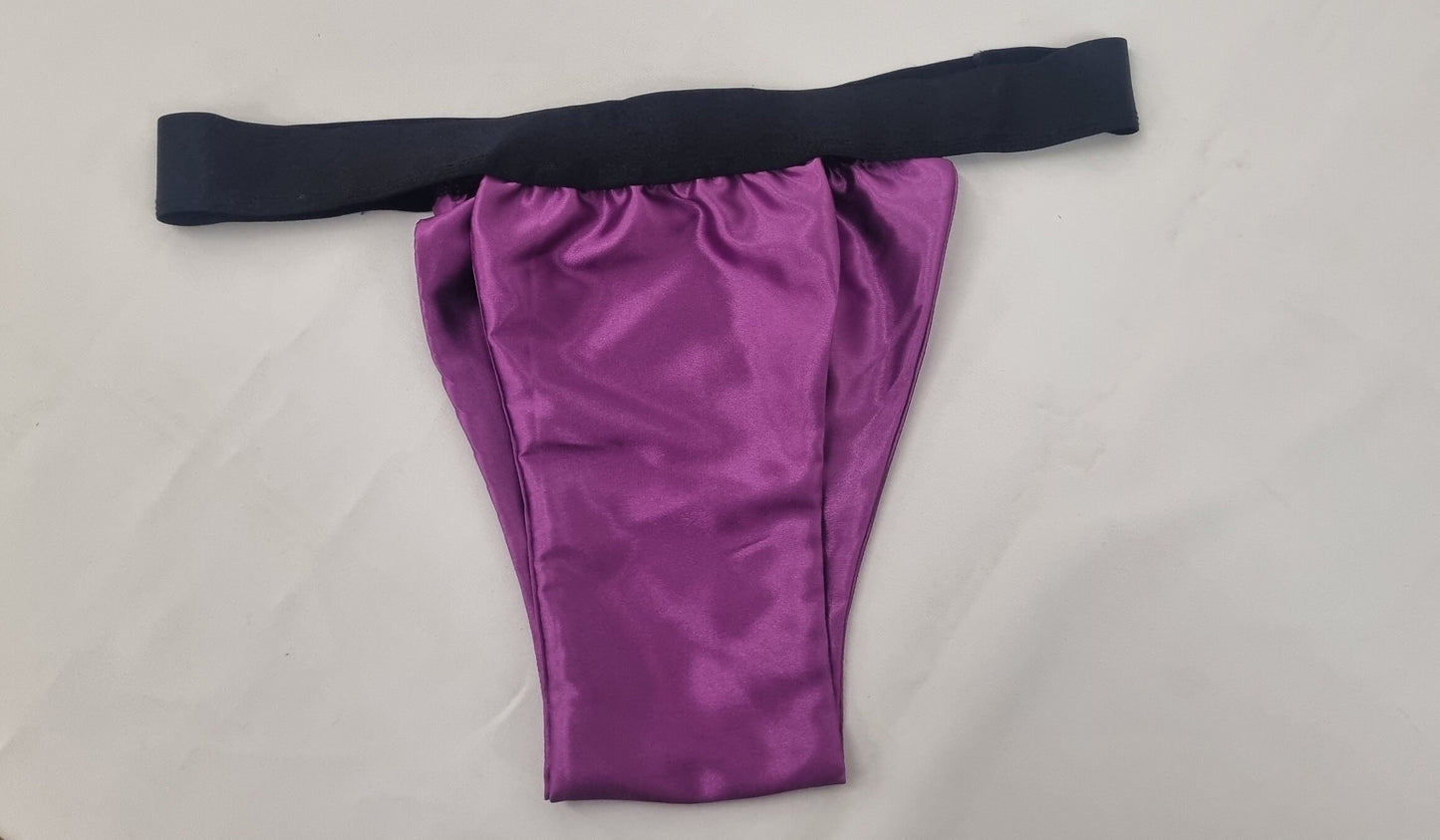 Men shiny satin briefs tanga like underwear fully lined with silky finish.