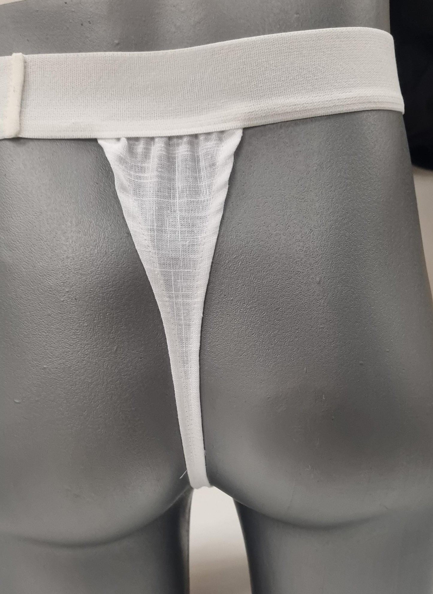 Men G-string briefs underwear in natural white linen. Cheeky boy thong sexy underwear for man.